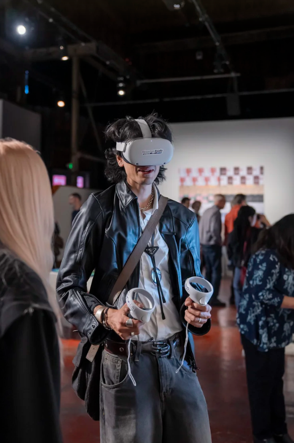 A visitor experiencing the disaster simulation